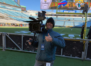 Filming at the NFL playoffs for Best Buy